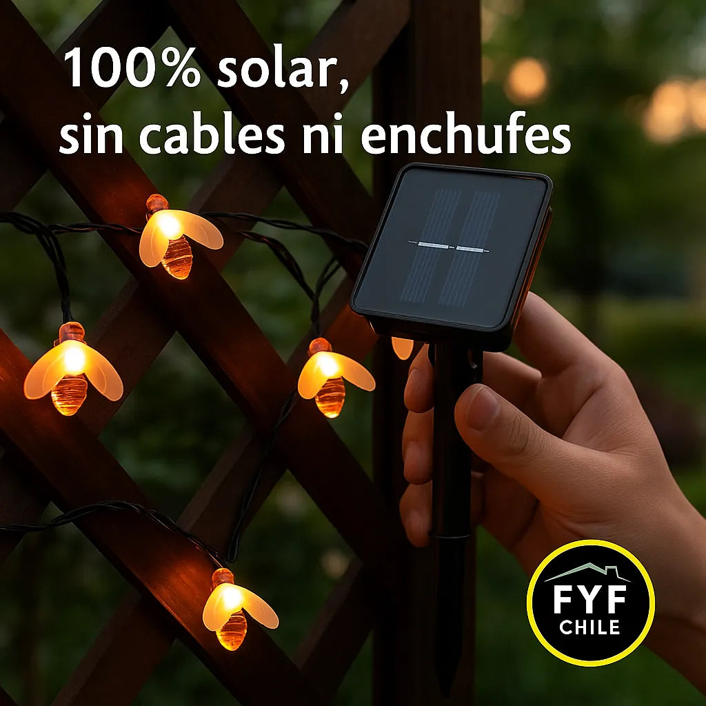 Guirnalda solar de abejitas encendida al atardecer, sin cables ni enchufes, cargando con panel solar